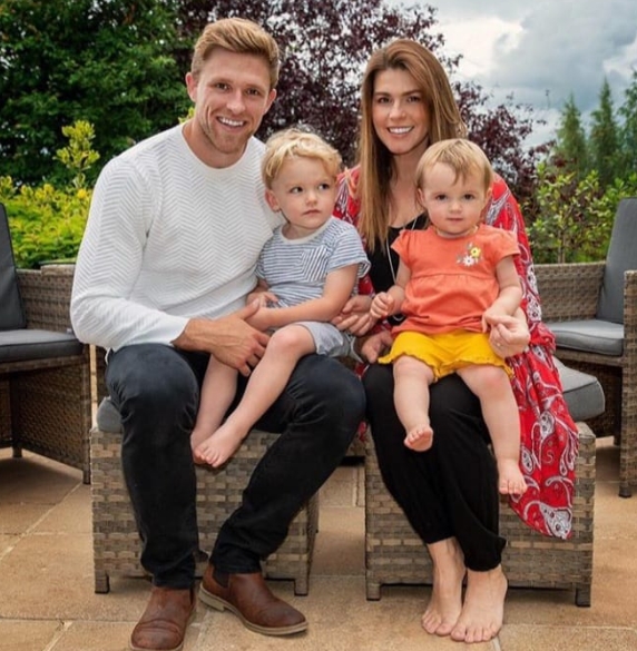 David Willey with his wife and their children